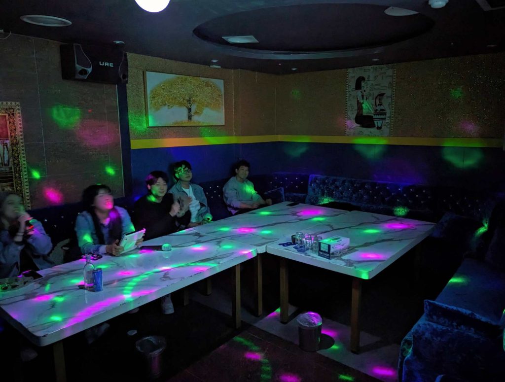 Singing karaoke at a traditional karoake room in Nonhyeon-dong, Gangnam District